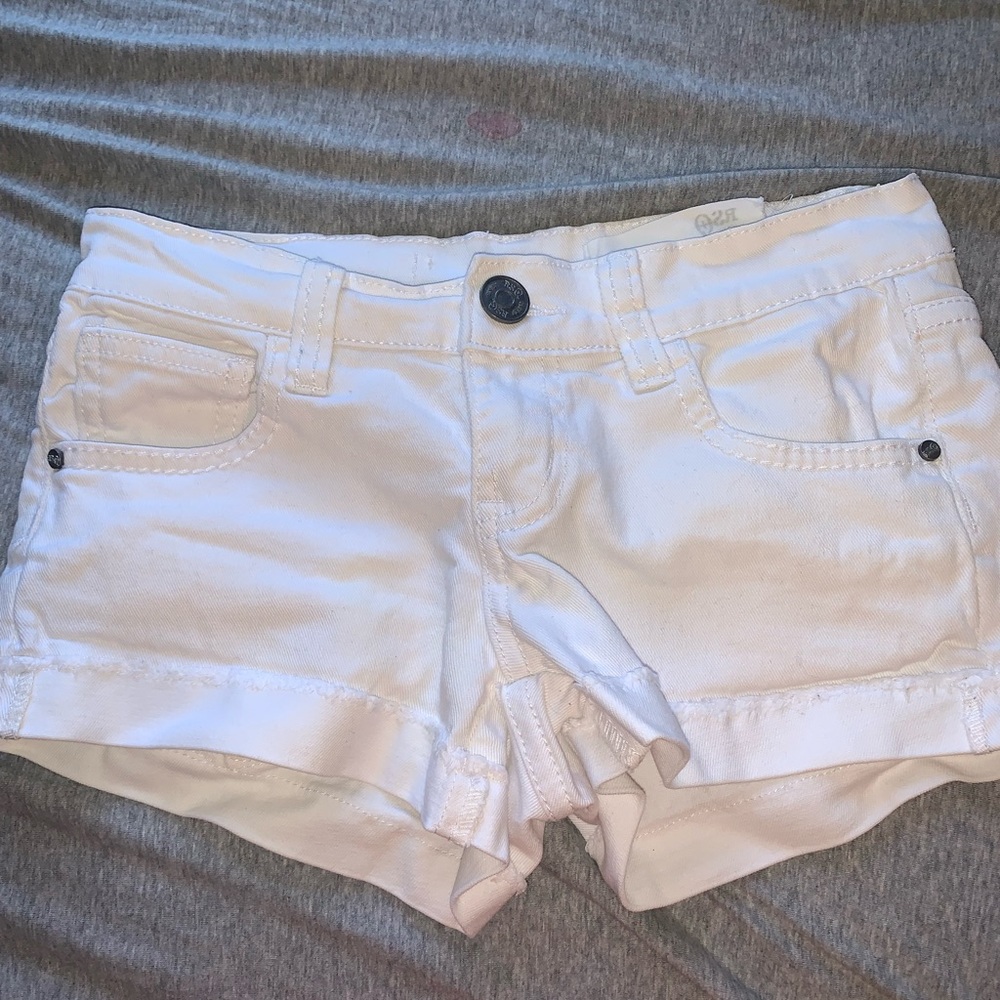 White RSQ Jean shorts.